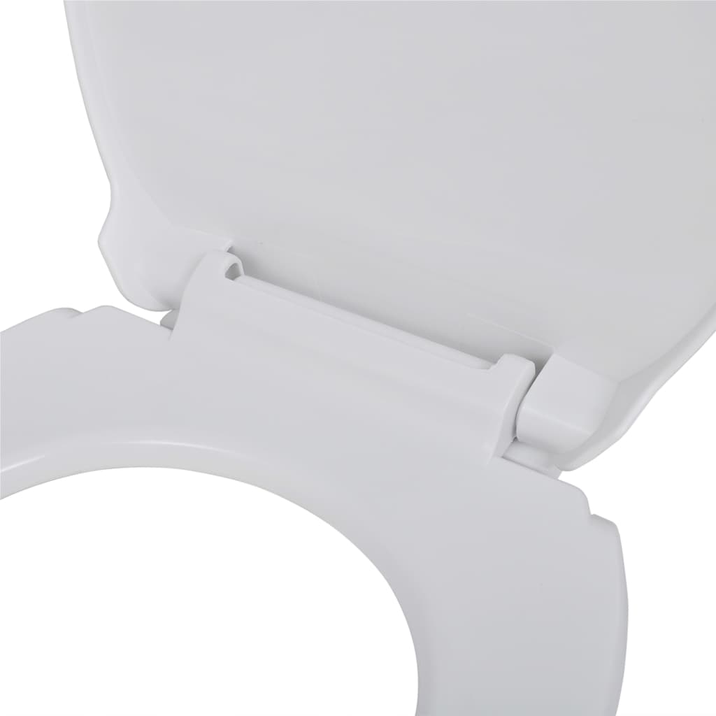 Close-up of a durable white plastic toilet seat with a soft-close hinge mechanism, ideal for family homes and restaurants.