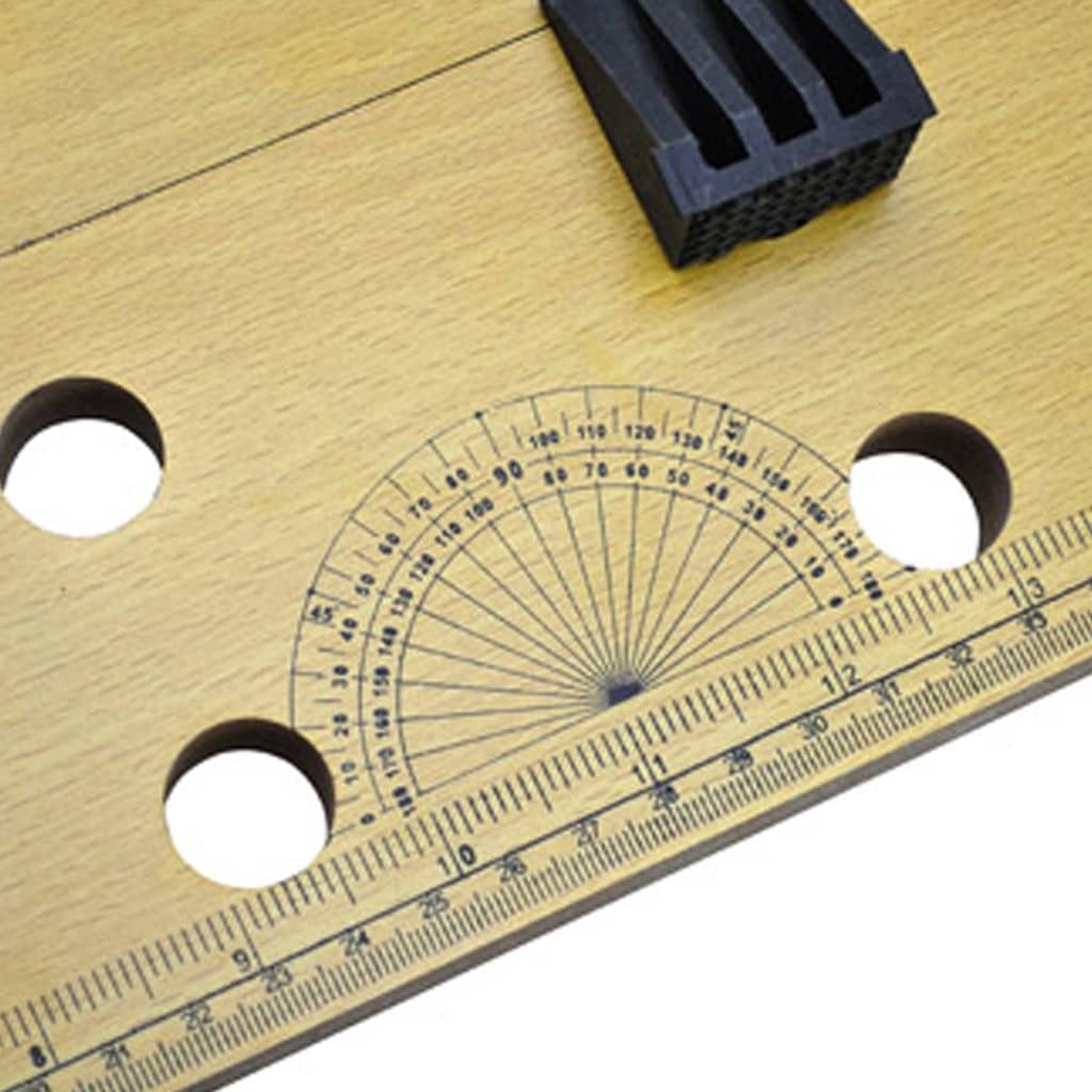 close-up of a workbench surface featuring a ruler and protractor for precise measurements and accurate cuts