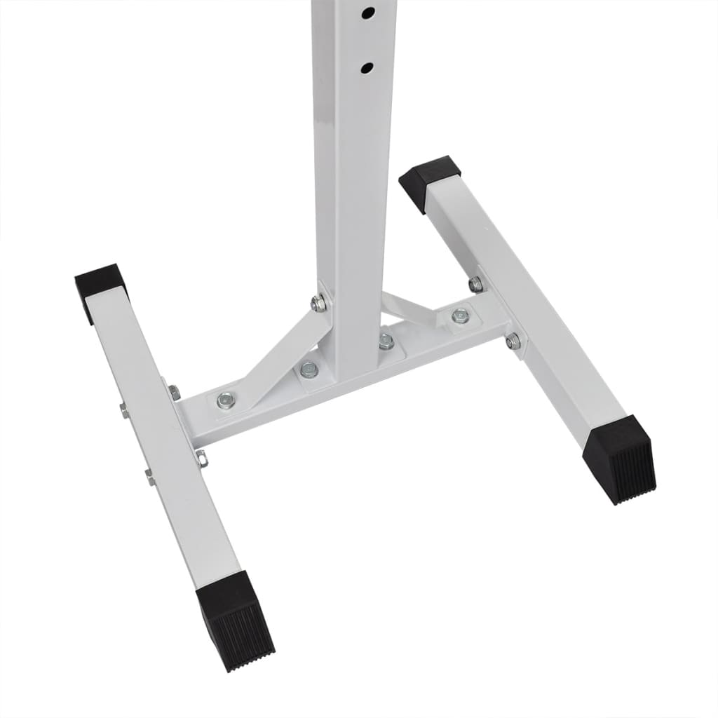 Close-up of squat barbell rack set base, showcasing sturdy steel construction and rubber feet for stability.