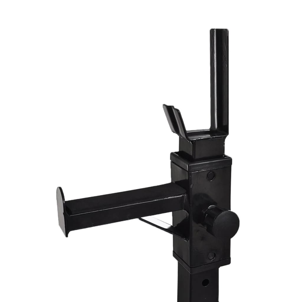 Close-up of a sturdy black barbell rack holder with adjustable height features for home gym use.