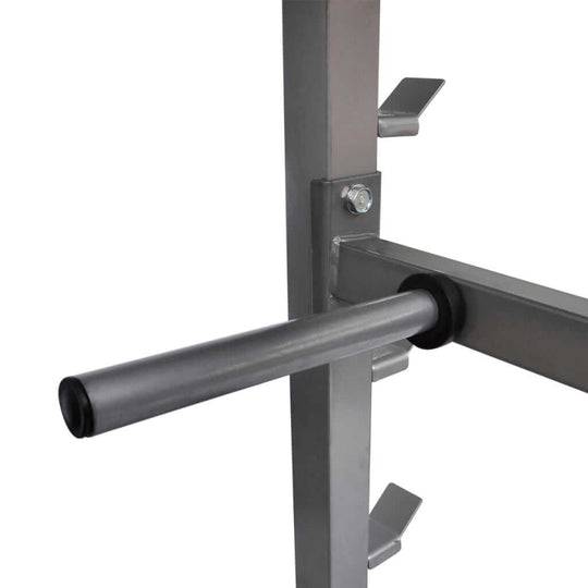 Close-up of a heavy-duty steel dumbbell barbell rack with a secure weight holder for organized free weights.