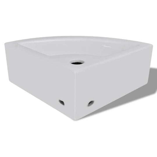 White ceramic corner wash basin with overflow, 45x32x12.5 cm, stylish for any bathroom or washroom decor.