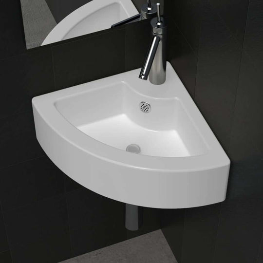 Ceramic white corner wash basin with overflow, modern design for chic bathrooms, dimensions 45x32x12.5 cm.