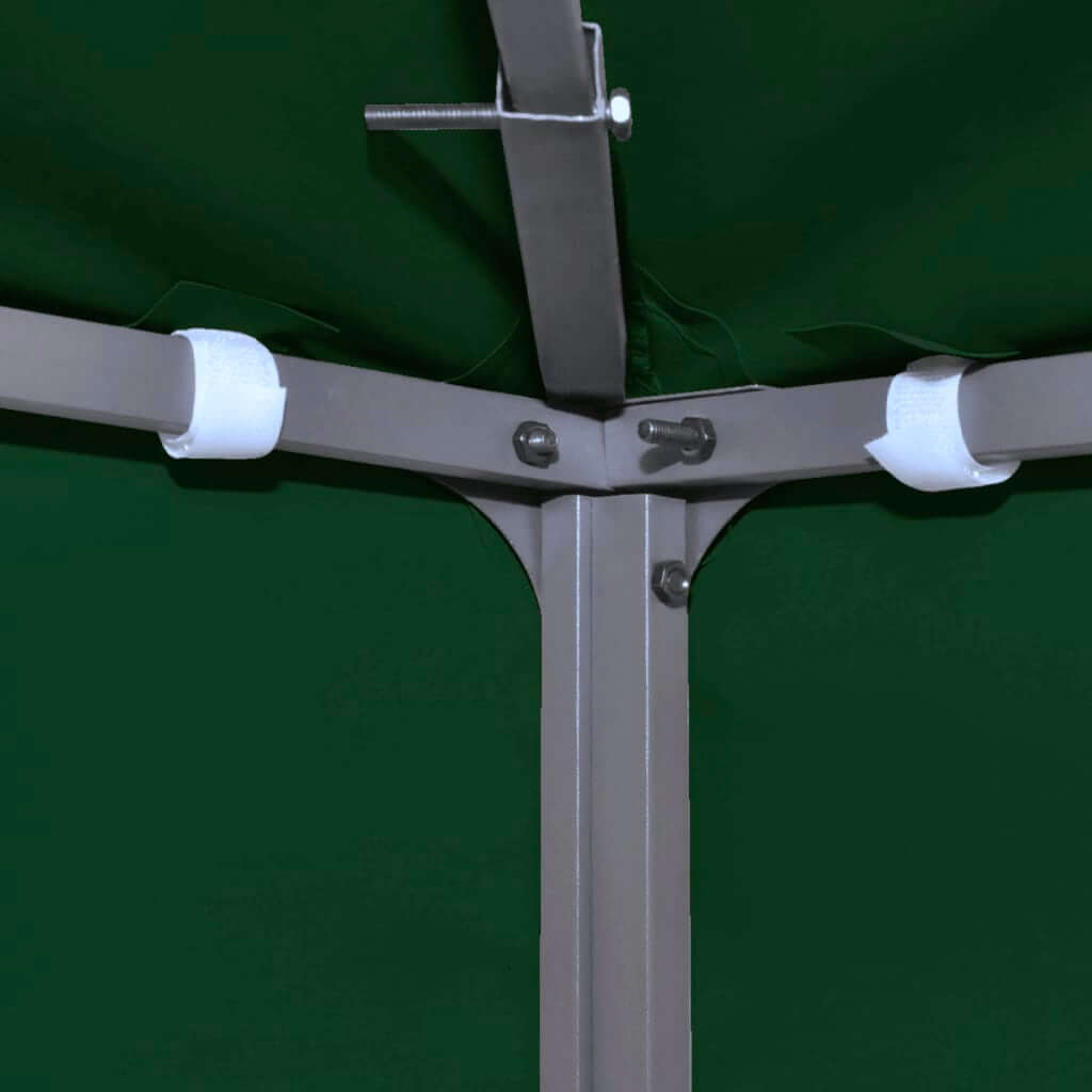 View of gazebo cover frame with green canopy, showcasing secure fittings and structural support for outdoor furniture.