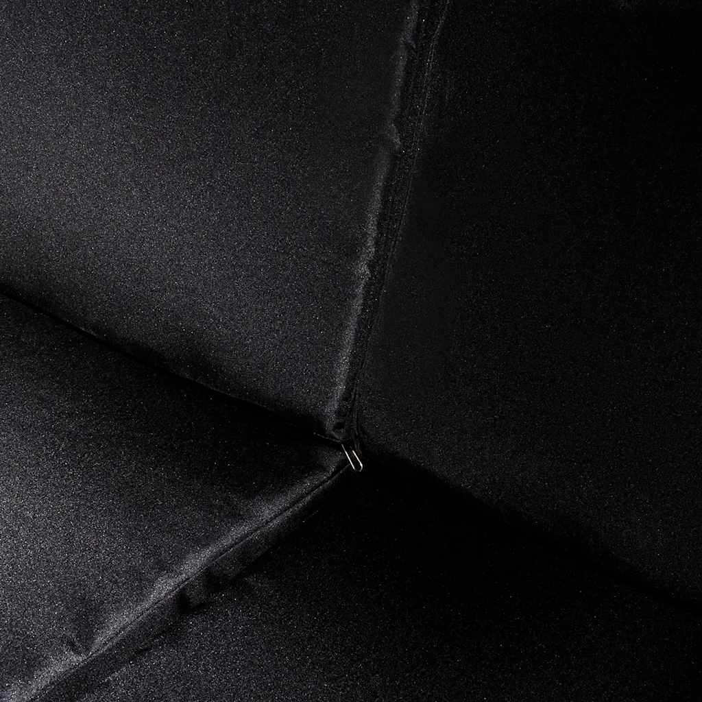 Piece Garden Lounge Close-up of black removable cushion fabric showing zipper detail for outdoor furniture comfort and style.