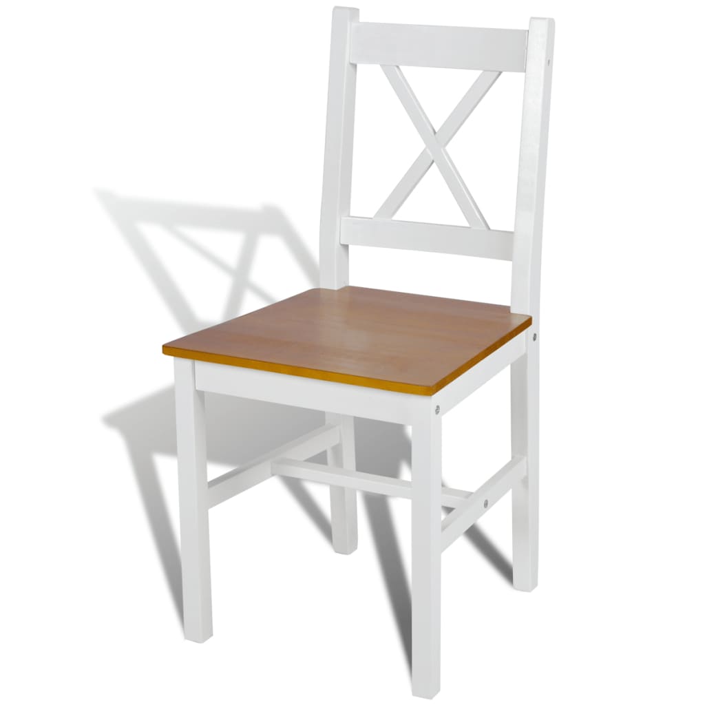 White wooden dining chair part of Dining Chairs 4 pcs Pinewood set, solid pine construction with a smooth paint finish.