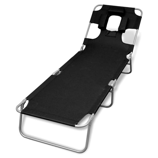 Folding sun lounger with head cushion in black, durable powder-coated steel frame, perfect for leisure and vacation.