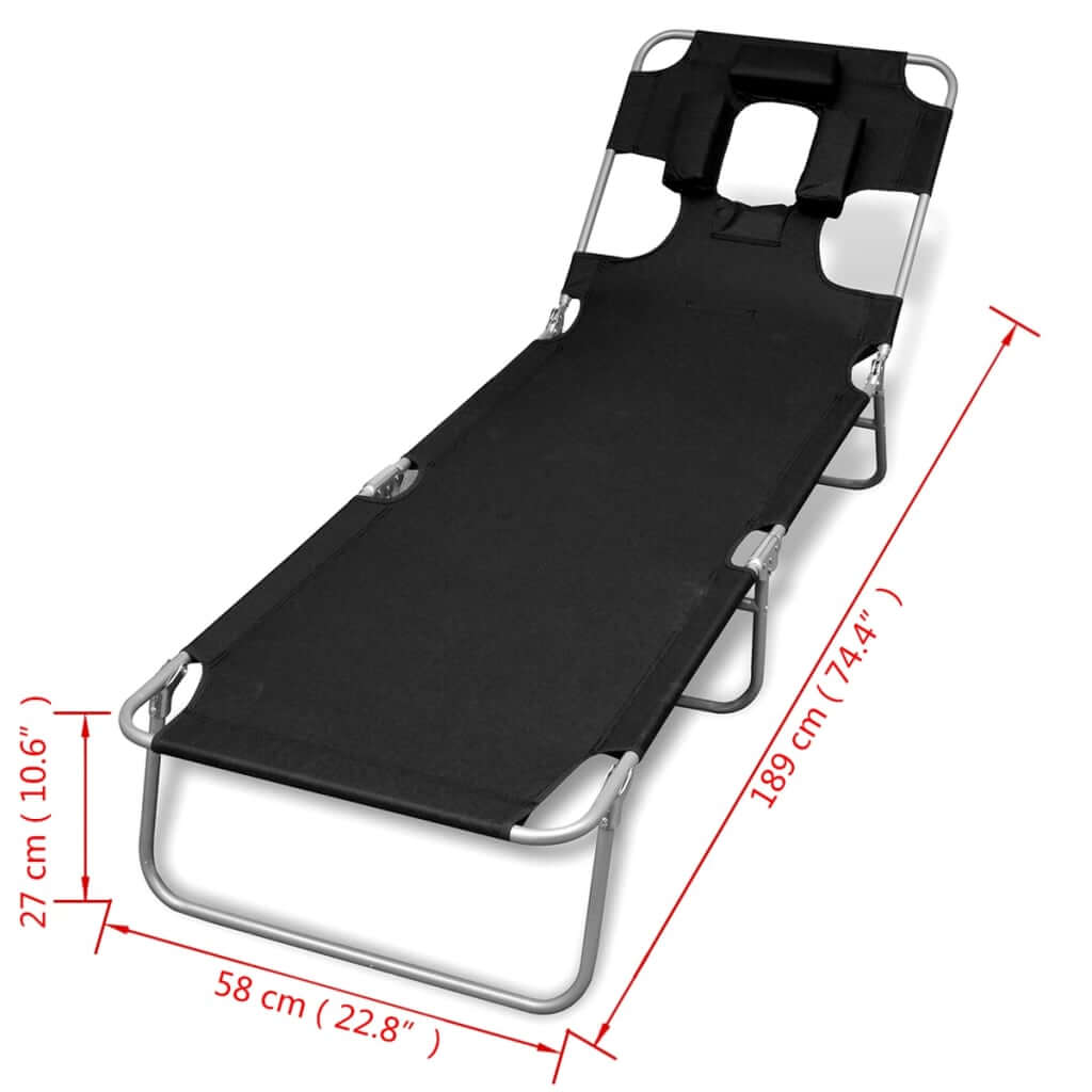 Folding sun lounger with head cushion, powder-coated steel, adjustable backrest, black color, ideal for outdoor relaxation.