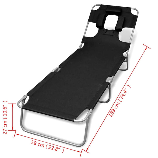 Folding sun lounger with head cushion, powder-coated steel, adjustable backrest, black color, ideal for outdoor relaxation.