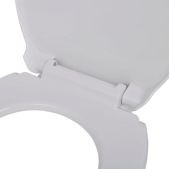 Close-up of a white oval soft-close toilet seat showing durable hinge and easy assembly features.