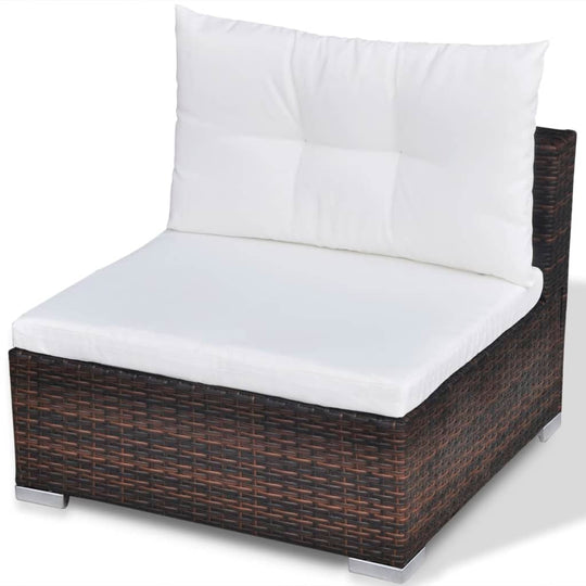 Comfortable outdoor lounge chair with white cushion and dark poly rattan frame, perfect for garden seating.