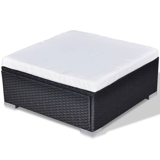 Stylish black rattan outdoor lounge set coffee table with white cushion, perfect for garden or patio use.