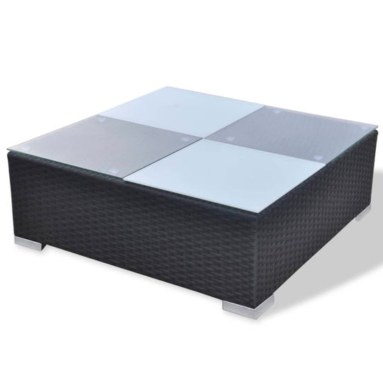 Modern square coffee table with glass top and rattan base for outdoor lounge and garden seating.