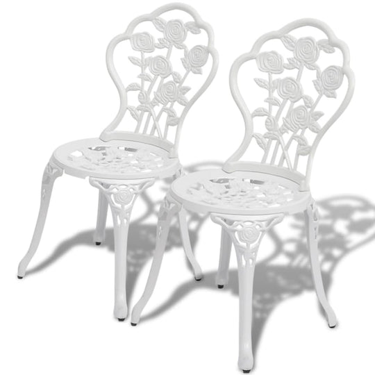 2 elegant white chairs featuring floral design, part of the 3 Piece Bistro Set Cast Aluminium collection.