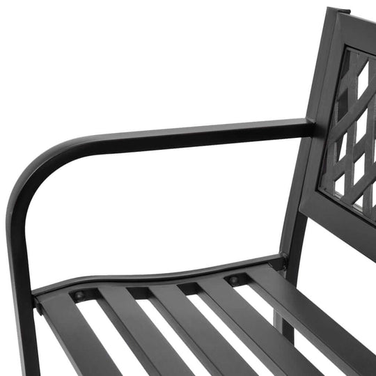 Close-up of a black steel garden bench armrest and backrest, showcasing its durable design and weather-resistant features.