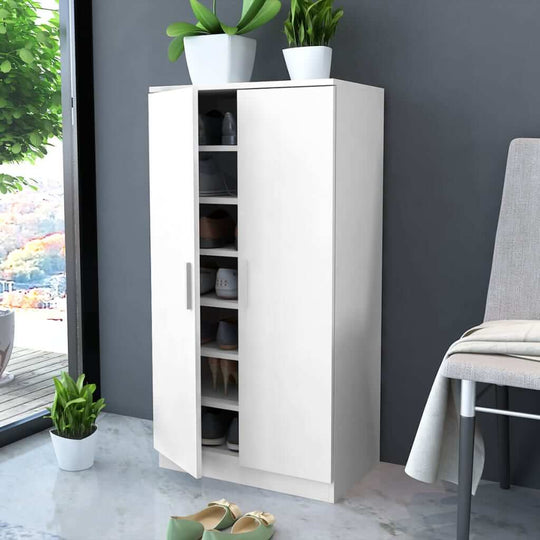 Modern white shoe cabinet with 7 shelves, neatly organized, perfect for storing shoes and reducing clutter in a stylish room.