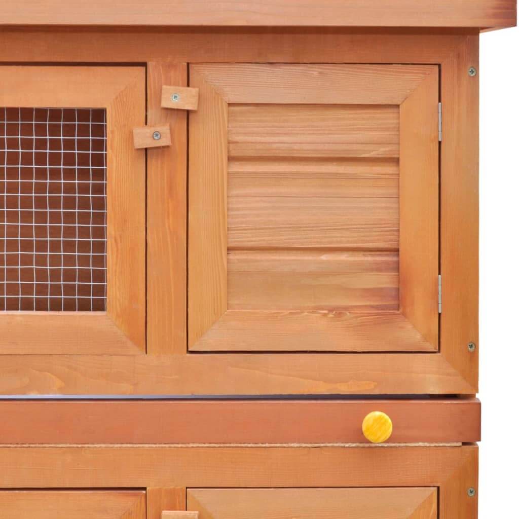 Wooden outdoor rabbit hutch with mesh doors for small pets, showcasing durable construction and secure access features.