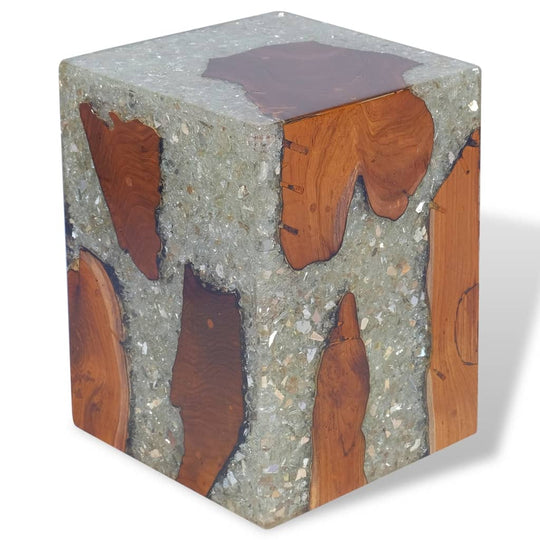 Unique solid teak wood and resin stool, perfect as outdoor furniture or side table, showcasing rustic charm and handcrafted details.