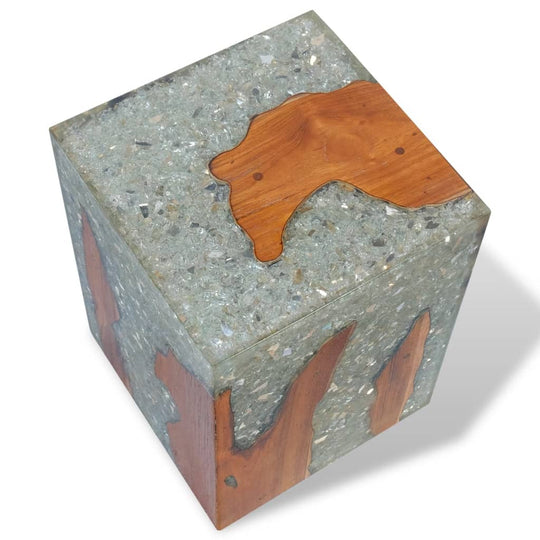 Solid teak wood and resin stool, perfect for outdoor living spaces and patio furniture, showcasing unique grain patterns.