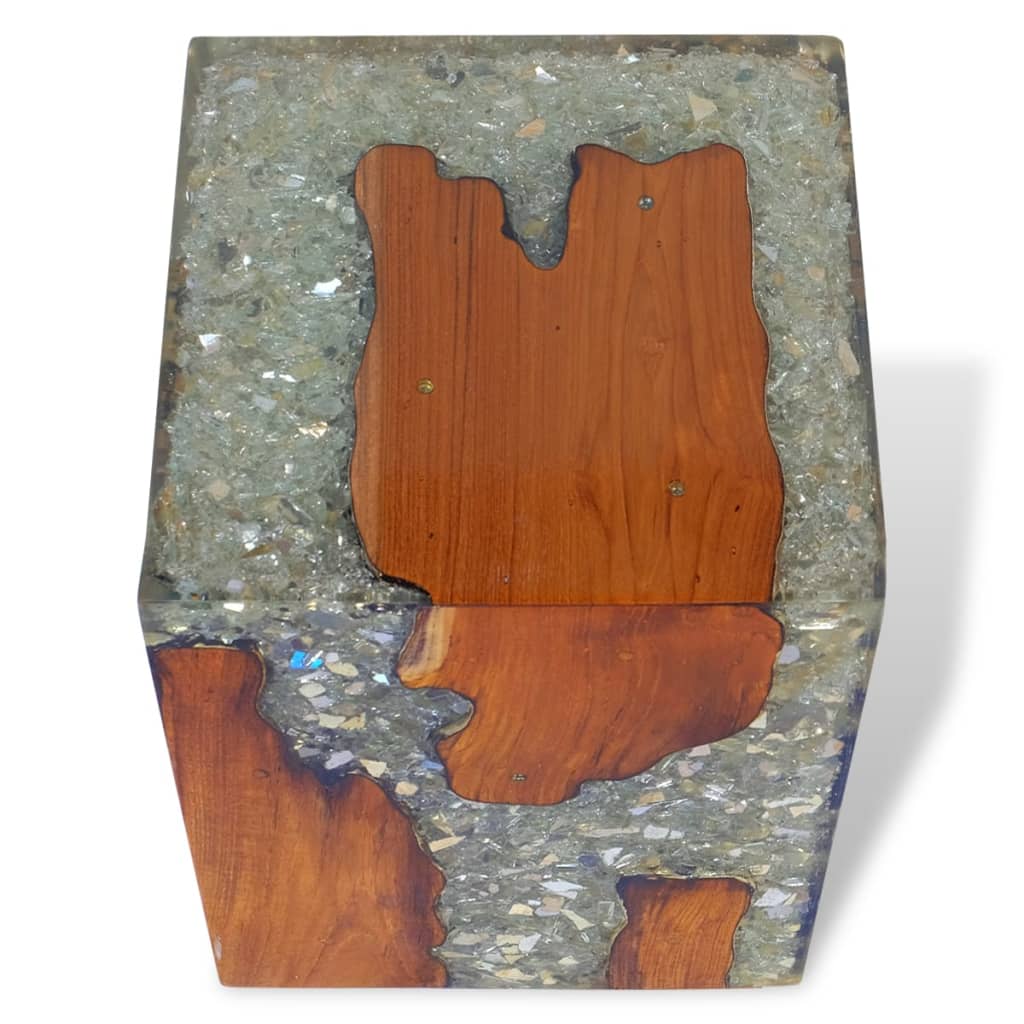 Handmade solid teak wood stool with transparent resin, perfect for outdoor living spaces and patio furniture.