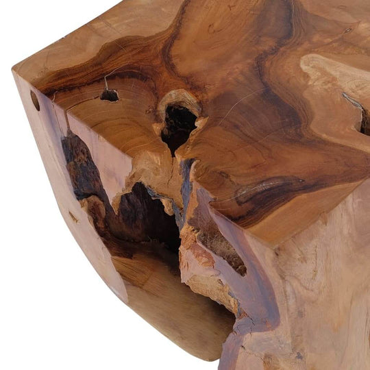 Close-up of a solid teak wood stool showcasing its unique grain patterns and rustic charm. Perfect for any decor.