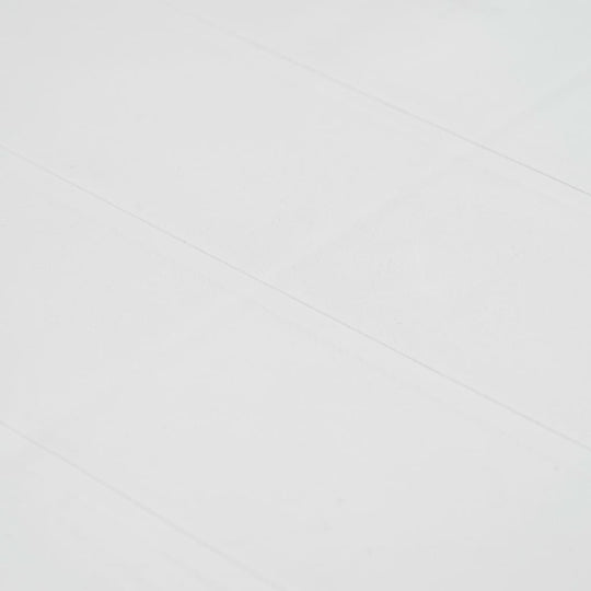 Close-up of white textured surface, detail view.