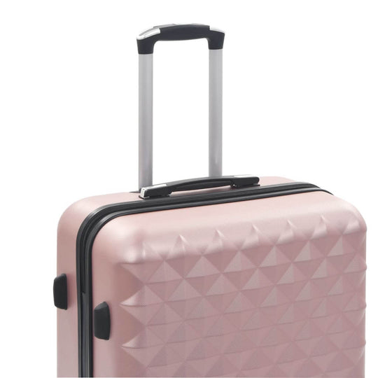 Hardcase trolley suitcase in rose gold with a secure handle and textured design for stylish travel.