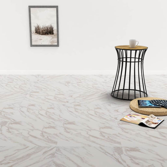 Elegant living space featuring self-adhesive PVC flooring planks in white marble, complemented by modern furniture and decor.