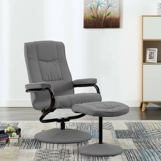 Light grey recliner chair with footrest, featuring soft fabric, strong frame, and stylish design for maximum comfort.