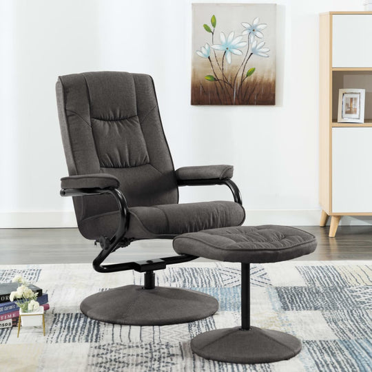 Dark grey recliner chair with footrest in modern living room setting, featuring comfortable fabric and stylish design.