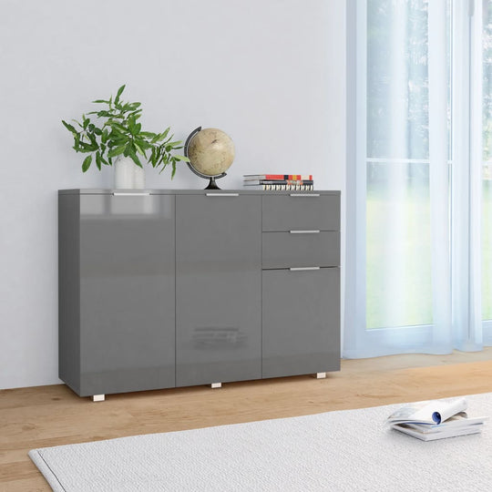 High gloss grey sideboard with two drawers and three doors, stylishly placed in a bright living room setting.