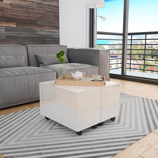 High gloss white coffee table in modern lounge setting, ideal for stylish living rooms and outdoor furniture.