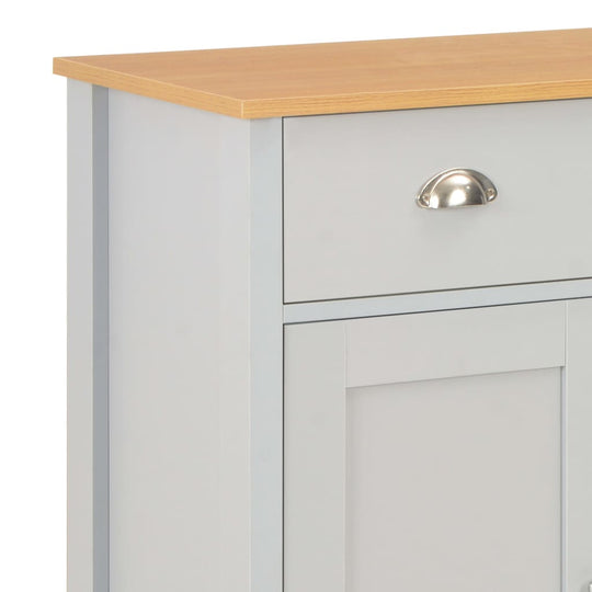 Close-up of a grey sideboard's drawers and wooden top, showcasing its durable design and elegant hardware.