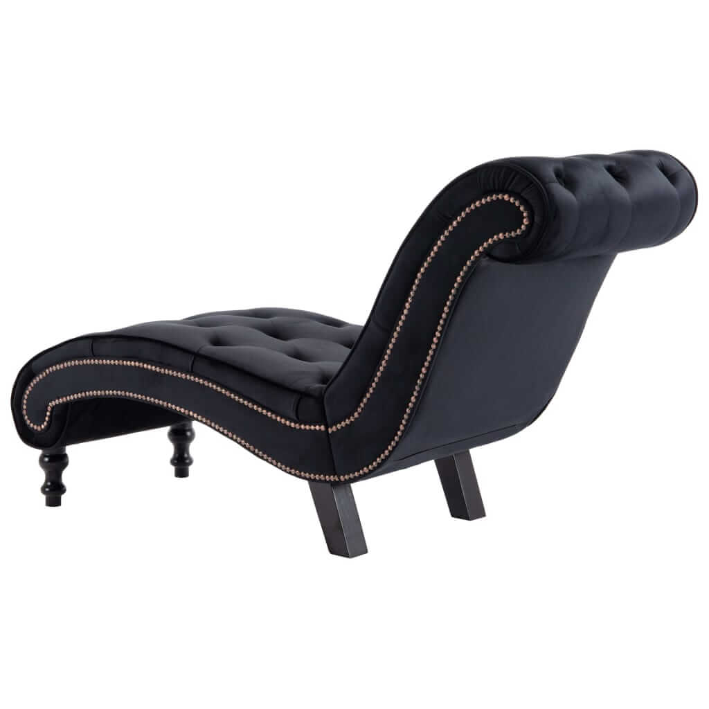 Luxurious velvet chaise lounge with ergonomic scroll design and button tufted detailing for an elegant home or outdoor space.