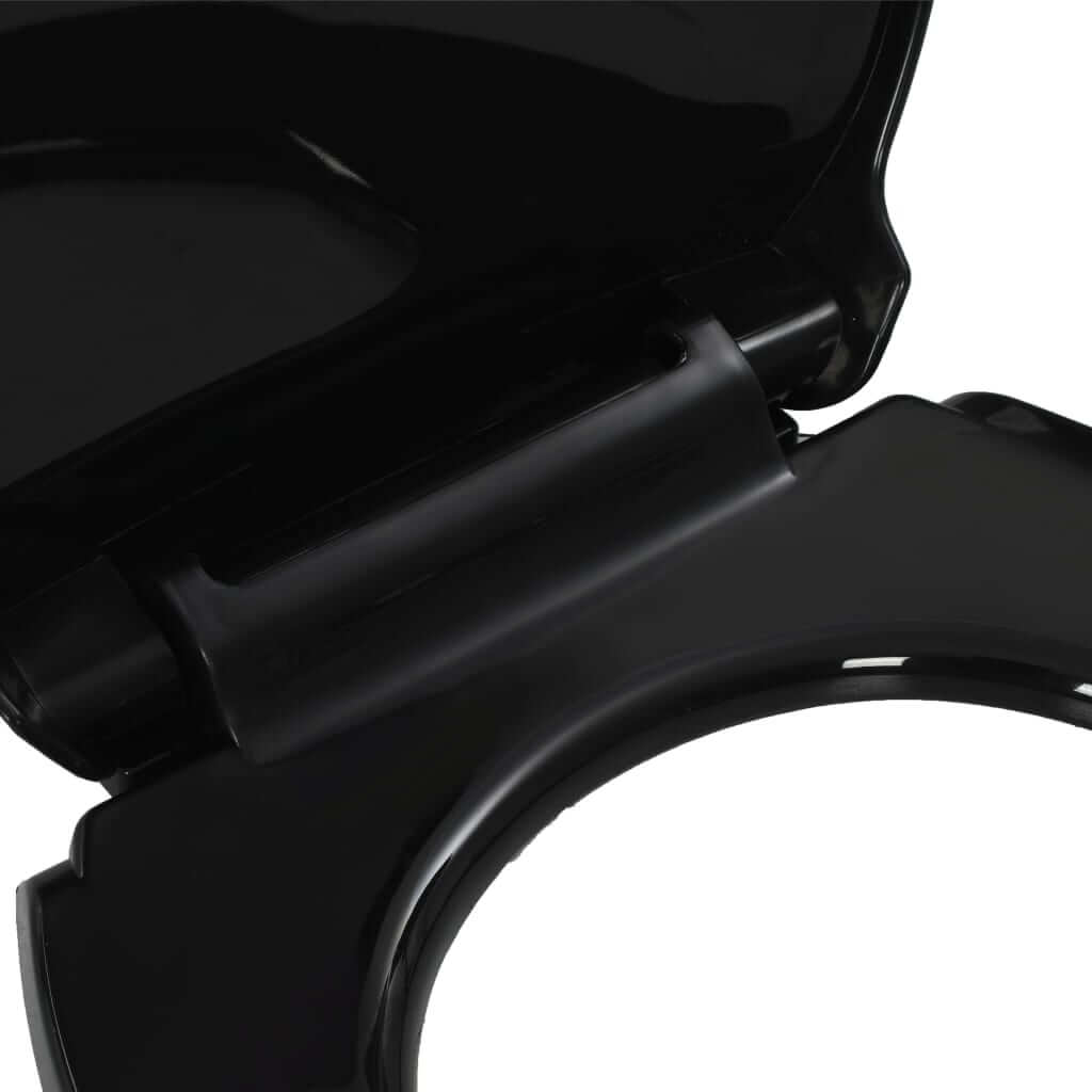 Close-up of a black soft-close toilet seat hinge for easy installation and maintenance, ideal for family homes and businesses.