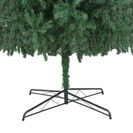 Artificial Christmas Tree 400 cm base and lifelike branches for a festive atmosphere.