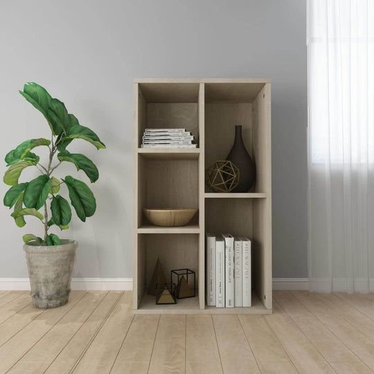 Book cabinet in Sonoma oak with five compartments, styled with decor and plants, ideal for organizing books and multimedia.