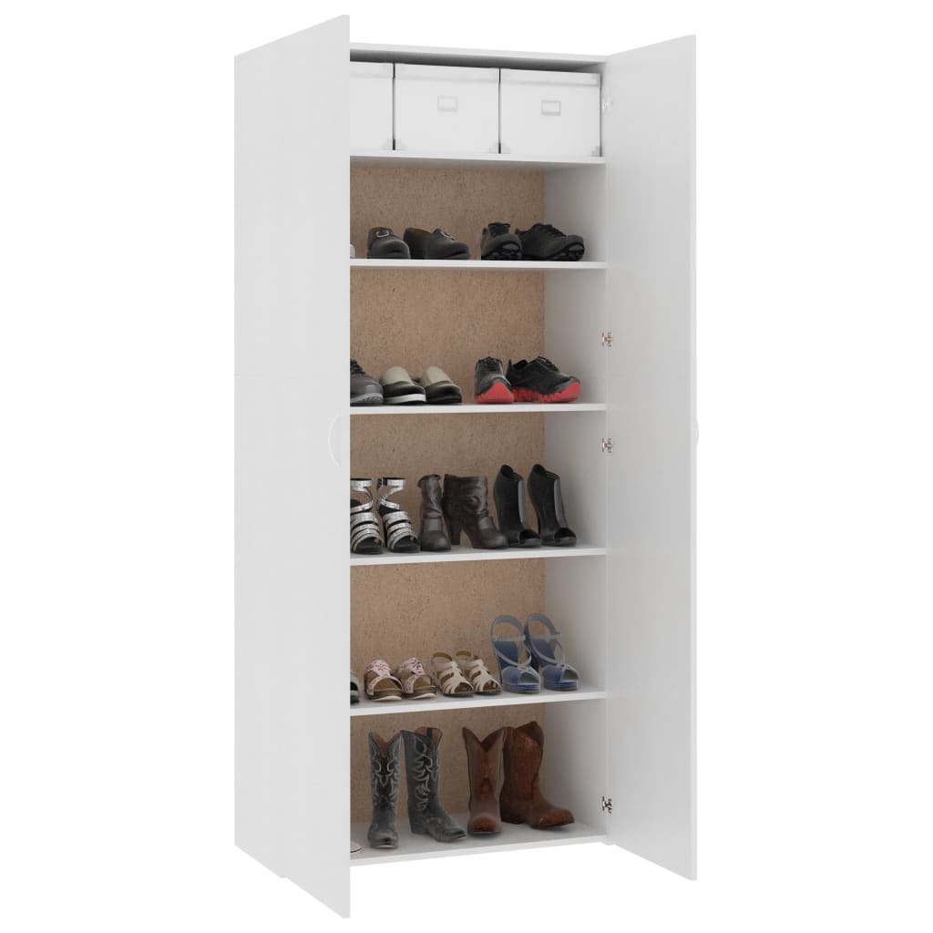 White shoe cabinet with six shelves, storing various shoes and two boxes on top, ideal for home organization.