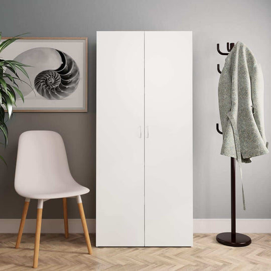 White shoe cabinet in a modern hallway with a chair and coat rack, showcasing stylish and practical furniture storage.