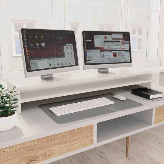 Modern white monitor stand with two screens on a desk, enhancing workspace efficiency and reducing strain.