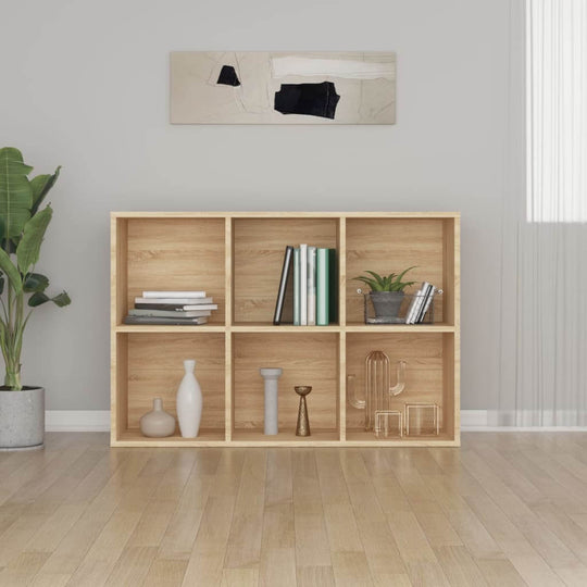 Book cabinet in Sonoma oak finish featuring six compartments, styled with decorative items and plants in a modern living space.