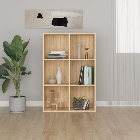 Book cabinet in Sonoma oak finish with six compartments, stylish decor, and greenery in modern living space.