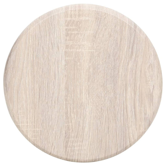 Round wooden surface in light finish, ideal for tabletop use or decor.