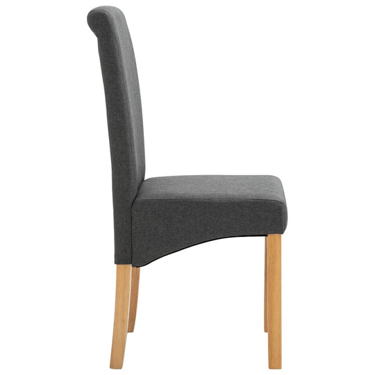 Side view of a grey fabric dining chair with a wooden frame, ideal for outdoor and indoor furniture settings.