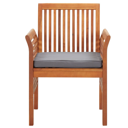 Garden dining chair made of solid acacia wood with a grey cushion, perfect for outdoor lounging and dining.