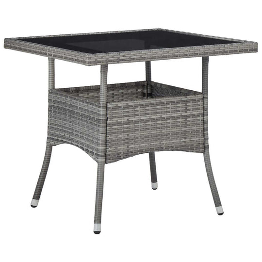 Outdoor dining table in grey poly rattan with glass top, perfect for patio furniture, accommodating up to 4 people.