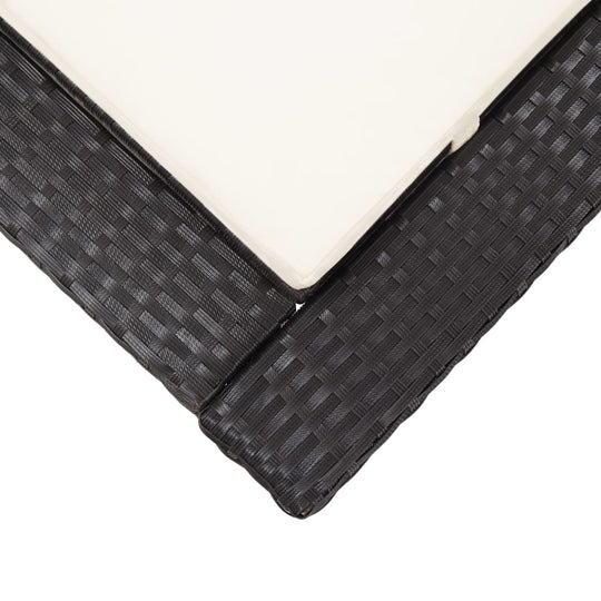 Close-up of the black poly rattan weave and cushion surface of a stylish sunbed, highlighting its quality and design.