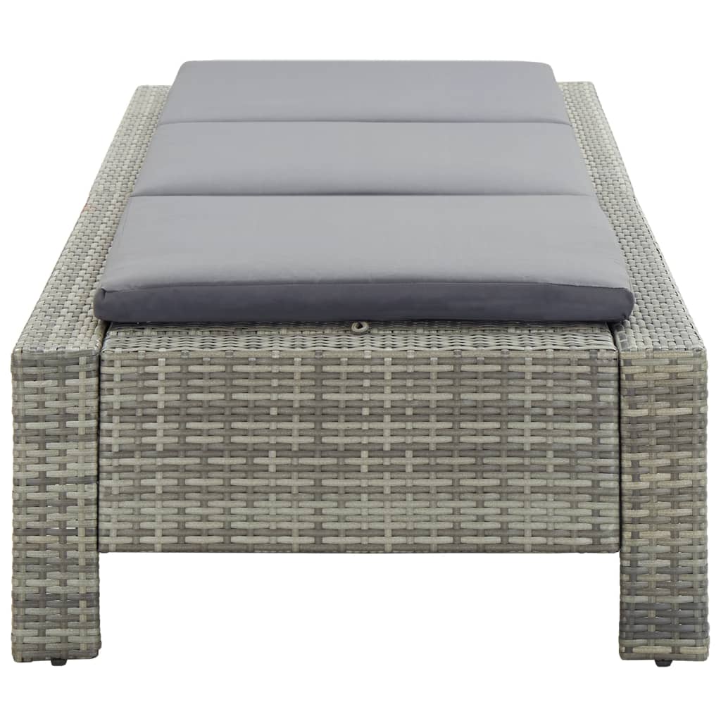 Grey poly rattan sunbed with cushion, perfect for relaxing by the pool, patio, or balcony. Weather-resistant and easy to clean.