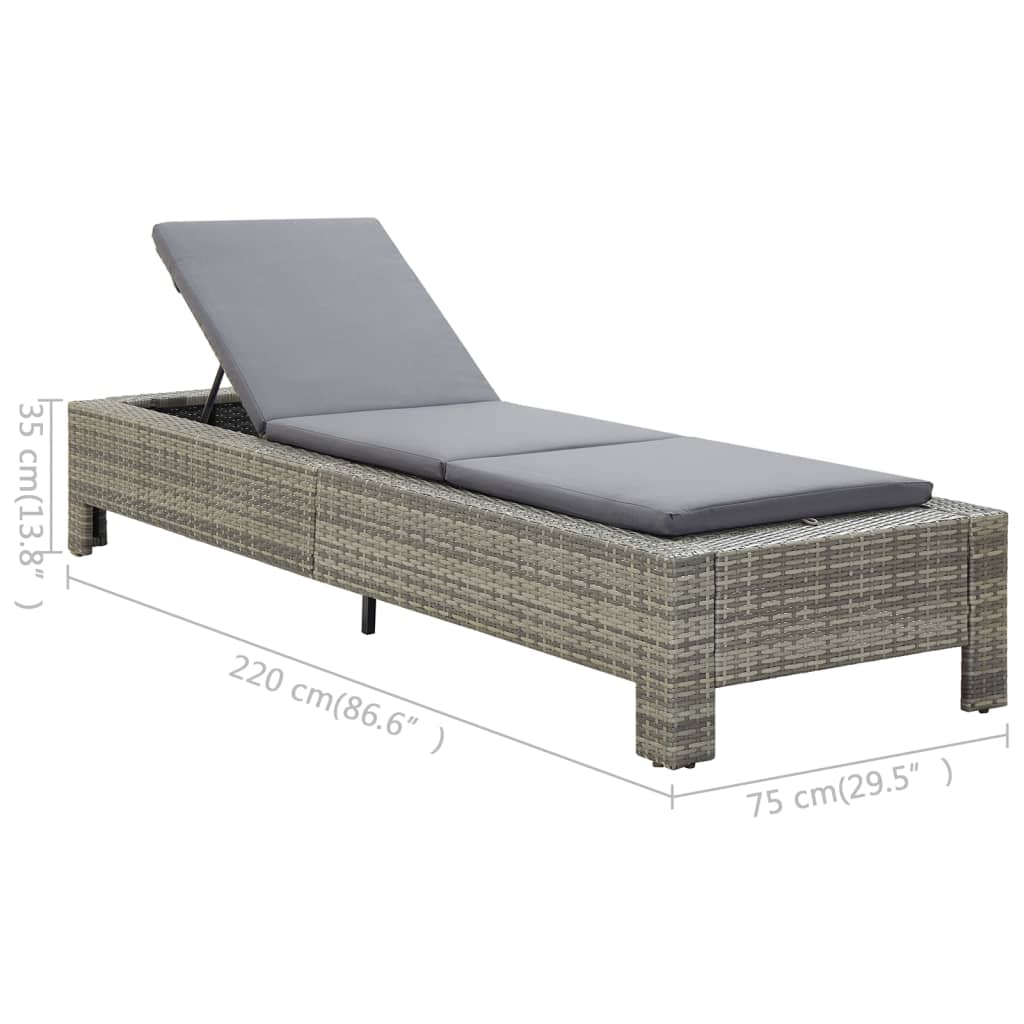 Comfortable grey poly rattan sunbed with cushion, ideal for relaxing by the pool or on the patio. Dimensions 220 cm x 75 cm.