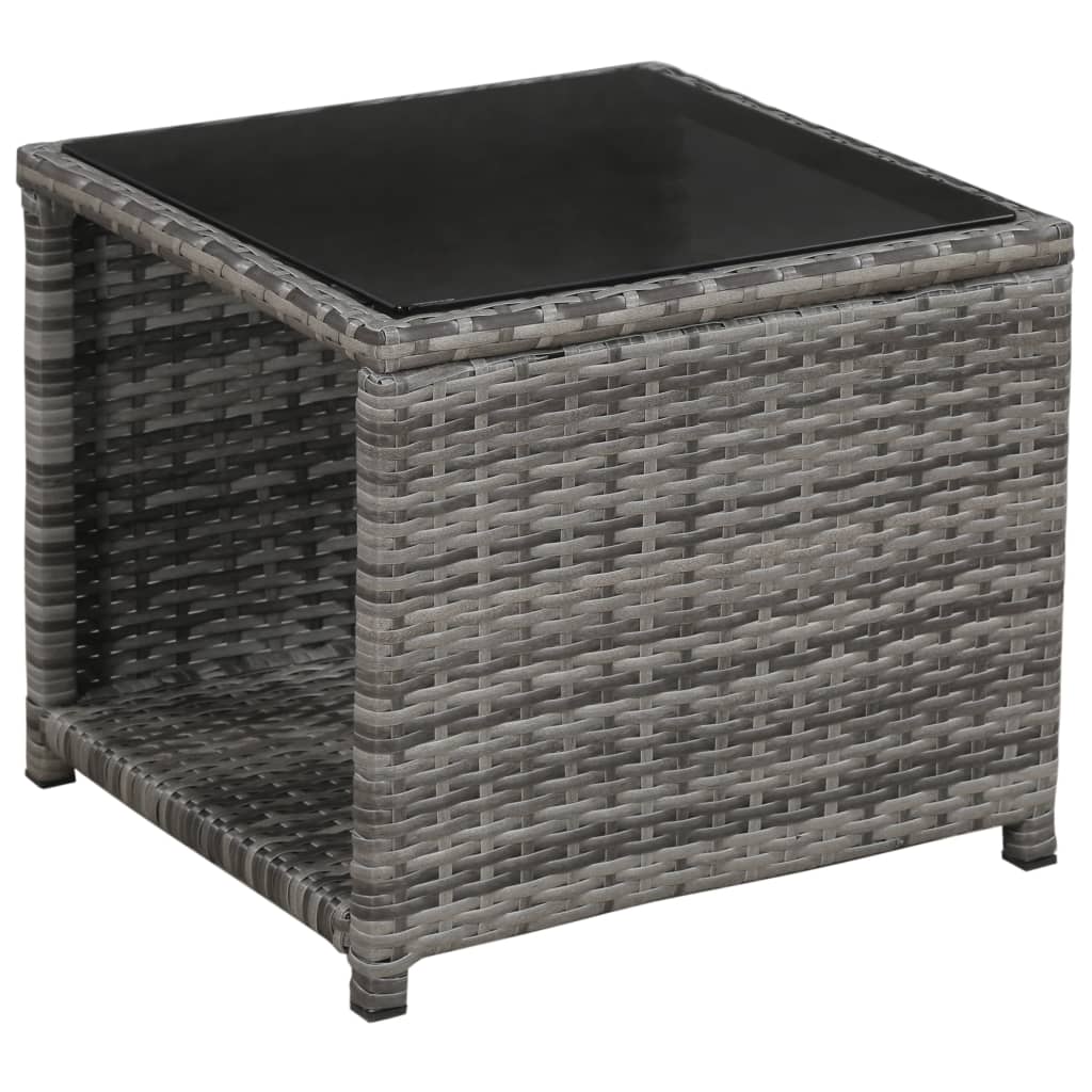 Stylish grey poly rattan side table with black glass top, perfect for outdoor lounge furniture.